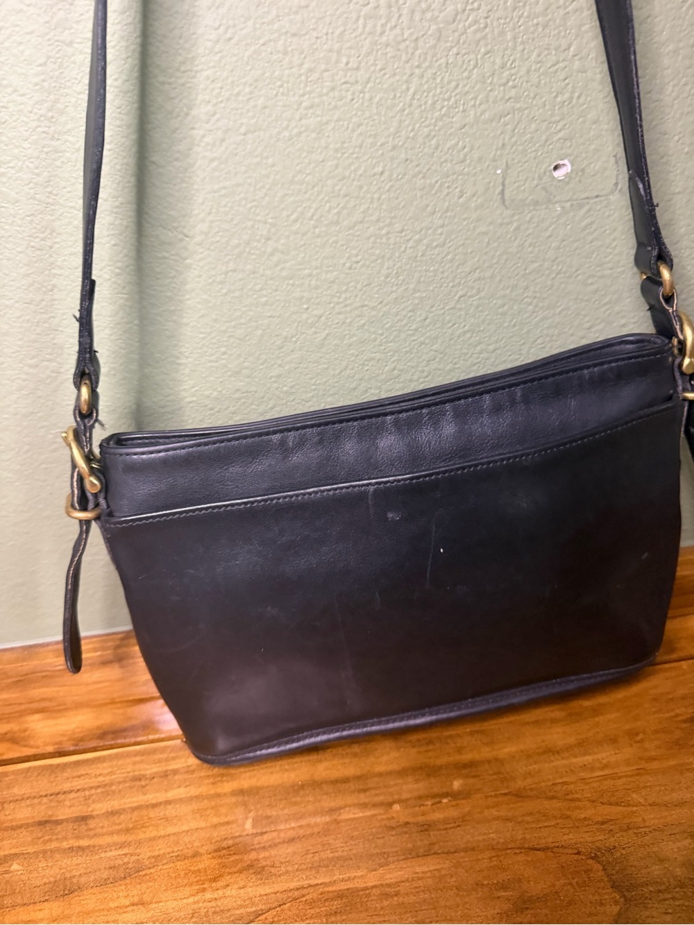 Coach Black Leather Shoulder Bag with Brass Hardware